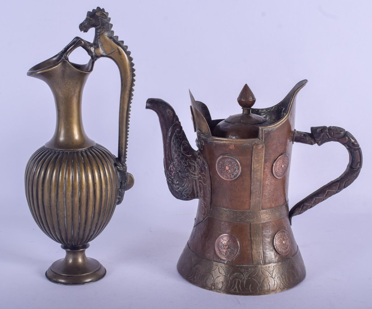 A 19TH CENTURY INDIAN GRAND TOUR TYPE BRONZE JUG together with a Tibetan Monks Cap style mixed metal