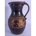 A LARGE EUROPEAN STUDIO POTTERY STONEWARE JUG painted with floral motifs. 27 cm high.
