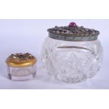 TWO VINTAGE CUT GLASS JARS AND COVERS. Largest 9 cm x 7 cm. (2)