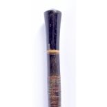 A RARE 19TH CENTURY MIDDLE EASTERN INDIAN CARVED FULL LENGTH RHINOCEROS HORN CANE of tapering form.