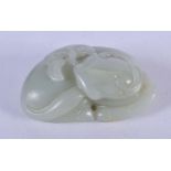AN EARLY 20TH CENTURY CHINESE CARVED GREEN JADE BULLOCK. 4.75 cm x 3 cm.