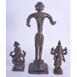 AN 18TH/19TH CENTURY INDIAN BRONZE FIGURE OF A BUDDHISTIC DEITY together with two others. Largest 23