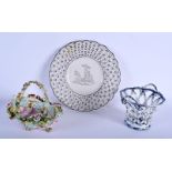 A 19TH CENTURY CONTINENTAL PORCELAIN FLORAL ENCRUSTED BASKET together with another basket and a plat