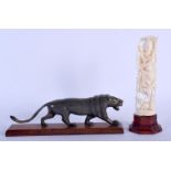 A 19TH CENTURY MIDDLE EASTERN CARVED RHINOCEROS HORN FIGURE OF A LION together with an antique Anglo