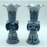 A Pair of Chinese Blue and white Gu vases with Scalloped rims decorated with birds and foliage 32cm