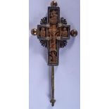 AN EARLY 18TH CENTURY SILVER MOUNTED CARVED CRUCIFIX decorated with saints. 21 cm x 8 cm.