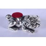 A SILVER BULLDOG PIN CUSHION. 16 grams. 5 cm x 2 cm.