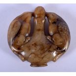 A CHINESE CARVED JADE ROUNDEL 20th Century. 5.5 cm x 5.5 cm.