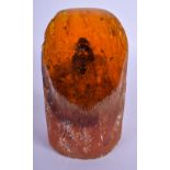A SMALLER CONTEMPORARY CONTINENTAL CARVED AMBER BOULDER. 14 cm x 8 cm.