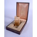 A 14CT GOLD DUNHILL LIGHTER. 72 grams overall. 5 cm x 2.75 cm.