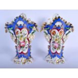 A LARGE PAIR OF 19TH CENTURY FRENCH PARIS PORCELAIN VASES painted with floral sprays. 31 cm x 16 cm.