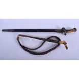 AN ANTIQUE ANTLER HORN HANDLED CONTINENTAL SWORD together with an antler handled whip. Largest 67 cm