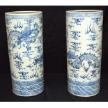 A pair of Chinese blue and white planters decorated with a dragon 63 x 27cm. (2)