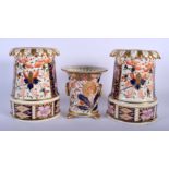 A PAIR OF EARLY 19TH CENTURY DERBY IMARI PORCELAIN VASES together with a Derby twin handled vase. La
