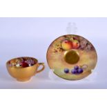 Royal Worcester demi-tasse cup and saucer painted with fruit by T. Lockver, signed, date mark 1918.