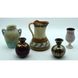 A collection of pottery jugs and vases including Myott and sons 19cm (5).