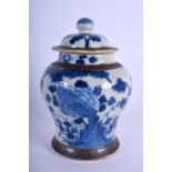 A 19TH CENTURY CHINESE BLUE AND WHITE CRACKLE GLAZED VASE AND COVER Qing, painted with flowers. 21 c