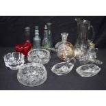 A collection of glassware items decanters, wine filter, vases, bottles etc Qty.