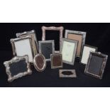 A group of silver plated picture frames 23 x 18cm (12).