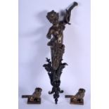 A PAIR OF 18TH CENTURY EUROPEAN BRONZE LIONS together with a bronze carytaid mounts. 42 cm long. (3)