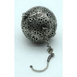 A Chinese white metal open work incense burner 6cm.