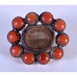 AN ANTIQUE SILVER AND CORAL MOURNING BROOCH. 5 grams. 2 cm x 2 cm.
