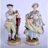 A PAIR OF 19TH CENTURY MEISSEN PORCELAIN FIGURES OF A MALE AND FEMALE modelled holding flowers upon