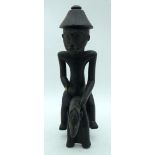 TRIBAL AFRICAN ARTSENUFO HORSE RIDER. Ivory Coast. Wooden equestrian figure of a man with a small
