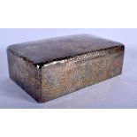 A LARGE EDWARDIAN HAMMERED SILVER CIGARETTE BOX. 1135 grams inc liner. London 1902. 23.5 cm x 8 cm.