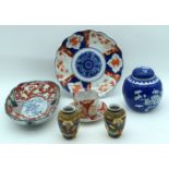 A collection of Japanese ceramics Satsuma/Kutani plates, vases, ginger jar etc 24cm (8).