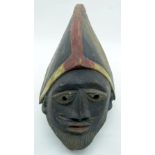 TRIBAL AFRICAN ART - YORUBA GELEDE MASK from Nigeria. The Gelede is a celebration of the power of w
