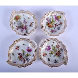 A SET OF FOUR LATE 19TH CENTURY DRESDEN PORCELAIN LEAF SHAPED DISHES painted with flowers and insect