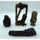 A Contemporary wooden carving of a male together with two pottery figures and another 23cm (4)