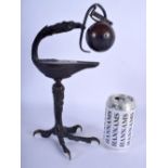 A RARE 19TH CENTURY ITALIAN GRAND TOUR BRONZE OIL LAMP formed as a claw and bird holding a circular