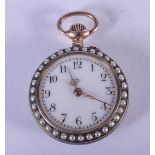 AN EDWARDIAN ENAMEL AND PEARL LADIES ROB WATCH. 18 grams. 3.75 cm wide.