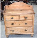A four drawer pine chest 108 x 93 x 47cm .