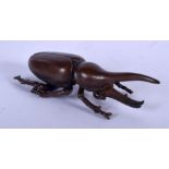 A JAPANESE BRONZE BEETLE OKIMONO. 8 cm x 2 cm.