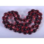 A CHERRY AMBER STYLE NECKLACE. 30 grams. 38 cm long.