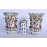 A PAIR OF 19TH CENTURY FRENCH SAMSONS OF PARIS PORCELAIN VASES modelled in the Chelsea Derby style.