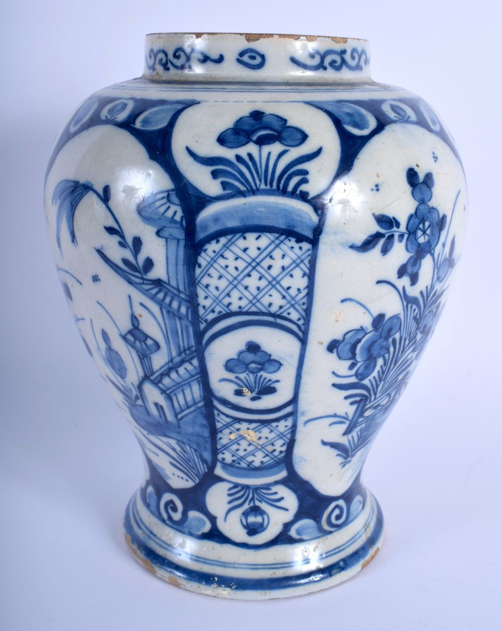 AN 18TH CENTURY DUTCH DELFT BLUE AND WHITE BALUSTER VASE painted with floral sprays. 23 cm x 12 cm. - Image 2 of 4