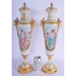 A LARGE PAIR OF CONTEMPORARY CONTINENTAL PORCELAIN VASES AND COVERS Sevres Style. 50 cm high.
