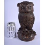 A 19TH CENTURY BAVARIAN BLACK FOREST CARVED WOOD TOBACCO JAR AND COVER modelled as a standing owl. 2