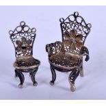 TWO SILVER CHAIRS. 6.9 grams. 3.5 cm x 2.5 cm. (2)