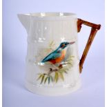 Royal Worcester barrel shape moulded jug painted with a Kingfisher by W. Powell, signed, date code 1