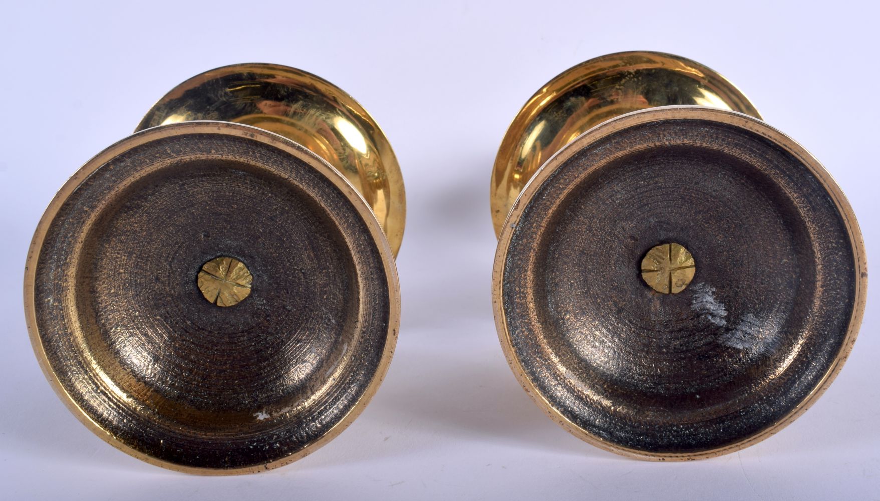 A PAIR OF 18TH CENTURY EUROPEAN BRASS CANDLESTICKS with circular drip trays. 23 cm high. - Image 3 of 3