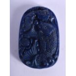 A CHINESE CARVED LAPIS LAZULI PENDANT 20th Century. 5 cm x 3.5 cm.