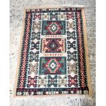 A small Persian rug 94 x 60cm.