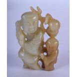 AN EARLY 20TH CENTURY CHINESE CARVED GREEN JADE FIGURE. 7 cm x 5 cm.