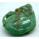 A Chinese carved jade boulder of a lizard on a rock 10cm