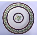 Sevres plate painted with green trailing leaves and three blue and gilt borders, date code PP for 17